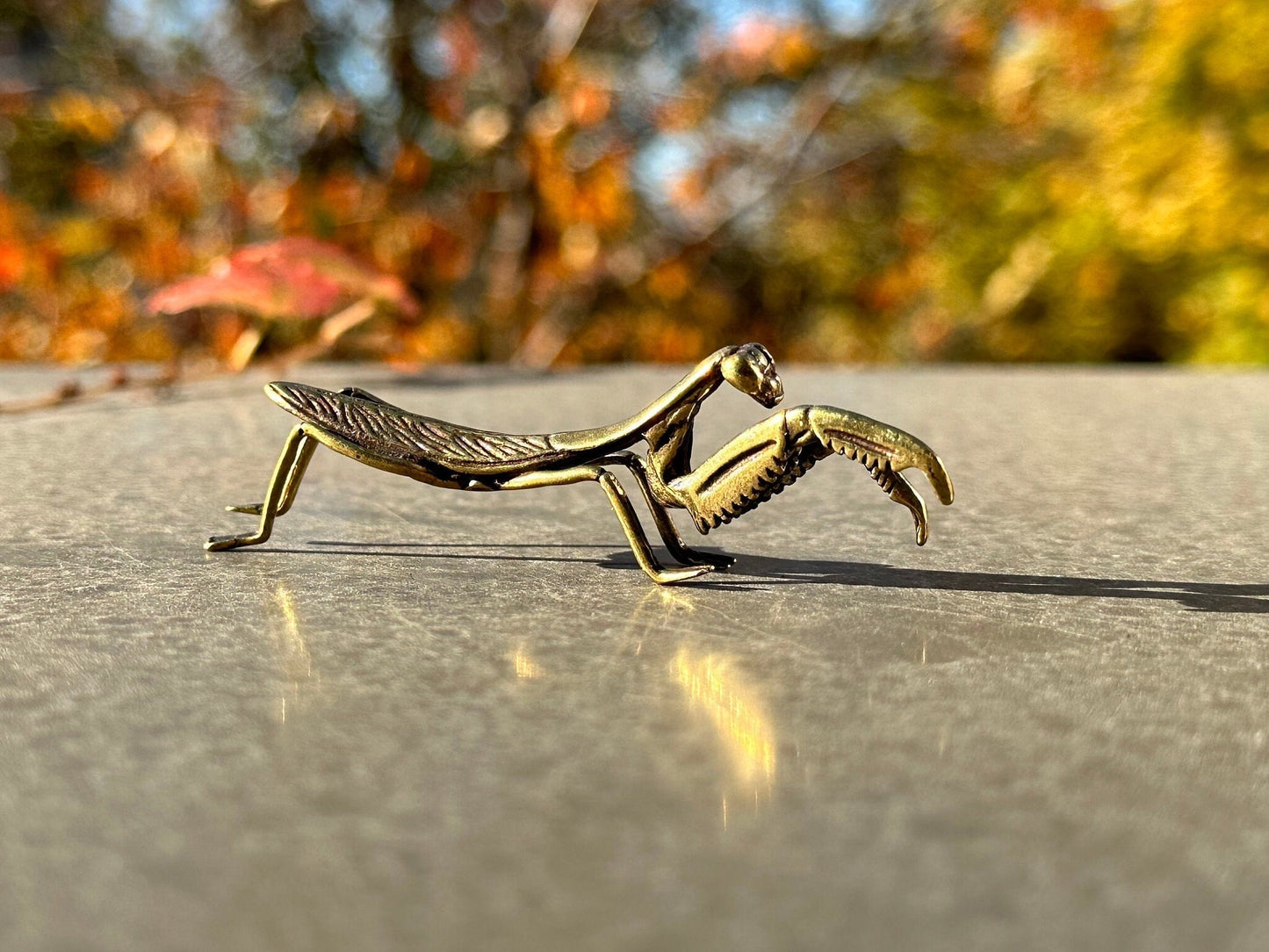 Brass mantis antique