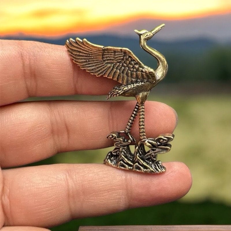 Brass crane antique